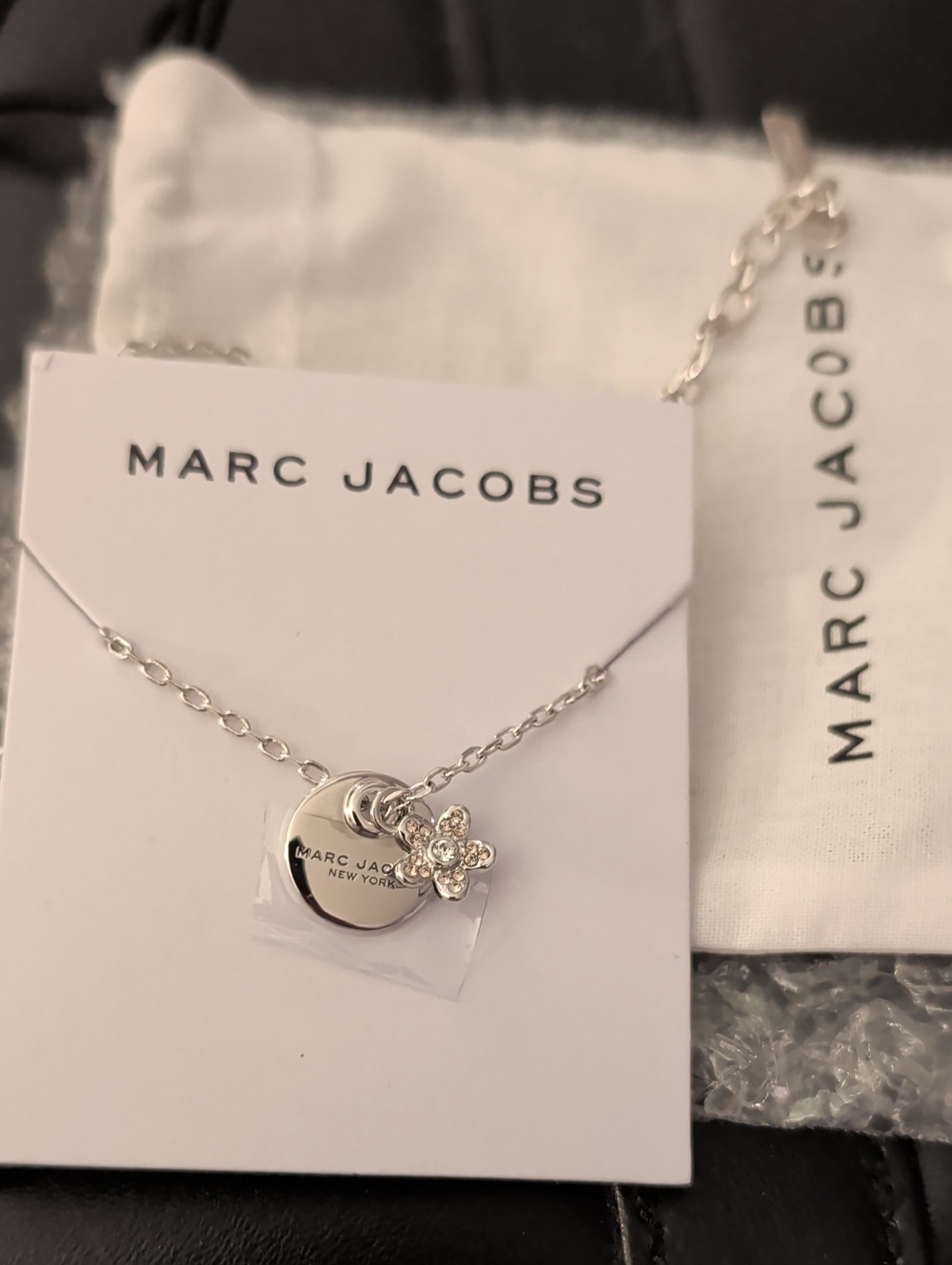 Marc Jacobs Silver Disc Necklace with Crystal Flower Charm